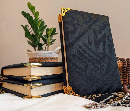 Kiswa edition Quran cover with gold accents 🕋